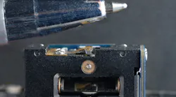 FIGURE 1. This two-mirror beam-steering system with piezo actuators is a highly miniaturized version of a conventional galvanometer ('galvo')-based beam-steering system.