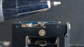 FIGURE 1. This two-mirror beam-steering system with piezo actuators is a highly miniaturized version of a conventional galvanometer (&apos;galvo&apos;)-based beam-steering system.