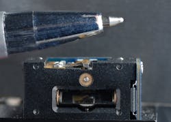 FIGURE 1. This two-mirror beam-steering system with piezo actuators is a highly miniaturized version of a conventional galvanometer ('galvo')-based beam-steering system. FIGURE 1. This two-mirror beam-steering system with piezo actuators is a highly miniaturized version of a conventional galvanometer ('galvo')-based beam-steering system.