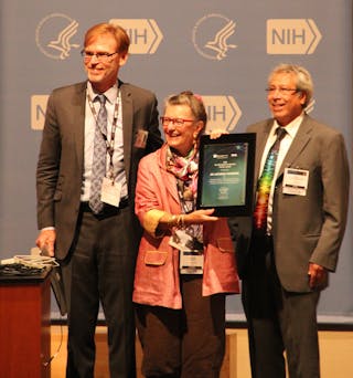 Bruce Tromberg (left) and Amir Gandjbakhche (right) presented Katarina Svanberg of Lund University (Sweden) with the 2015 NIH Bench-to-Bedside Pioneer Award.