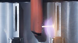 FIGURE 1. The cylindrical surface of a bore for an automobile engine is micromachined using a 2 kW single-mode fiber laser from IPG Photonics, then sprayed with plasma to create a hard coating that replaces conventional cylinder liners. Laser-machined microgrooves help the resulting coating to adhere to the cylinder. FIGURE 1. The cylindrical surface of a bore for an automobile engine is micromachined using a 2 kW single-mode fiber laser from IPG Photonics, then sprayed with plasma to create a hard coating that replaces conventional cylinder liners. Laser-machined microgrooves help the resulting coating to adhere to the cylinder.