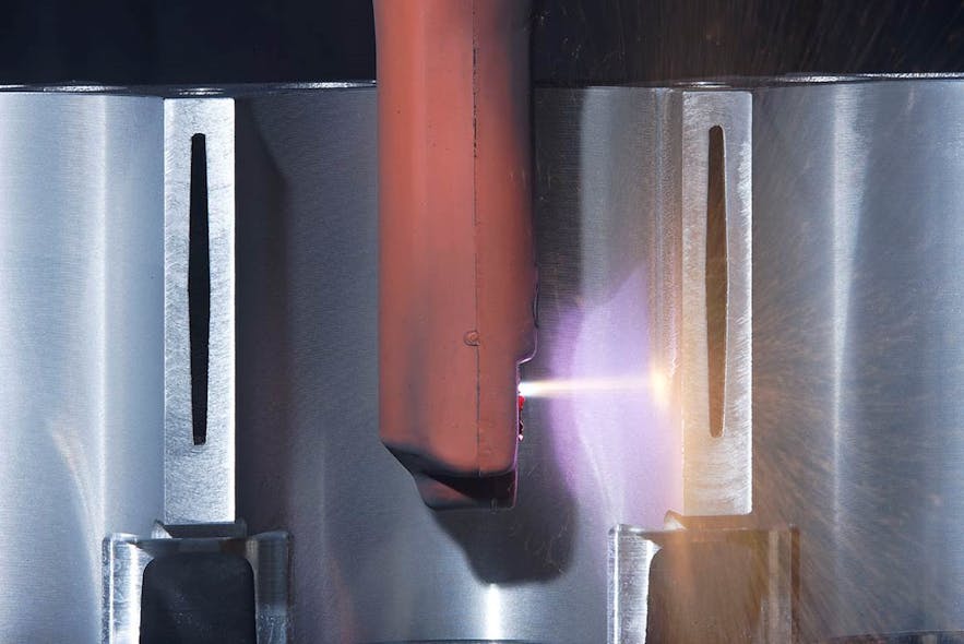 FIGURE 1. The cylindrical surface of a bore for an automobile engine is micromachined using a 2 kW single-mode fiber laser from IPG Photonics, then sprayed with plasma to create a hard coating that replaces conventional cylinder liners. Laser-machined microgrooves help the resulting coating to adhere to the cylinder.