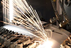 FIGURE 3. A Rofin scanner-based fiber laser welds automotive parts. FIGURE 3. A Rofin scanner-based fiber laser welds automotive parts.