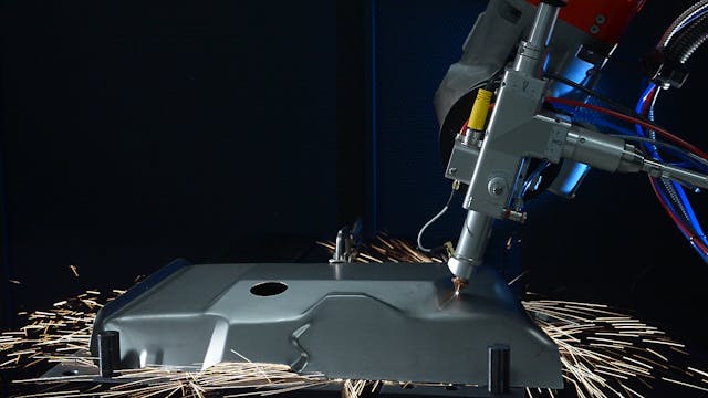 FIGURE 5. A Coherent Highlight FL fiber laser can be combined with robotics to enable high-speed 3D part cutting for industries such as white goods (washing machines, kitchen stoves, and so on).