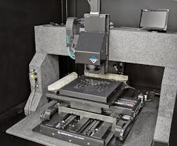 FIGURE 2. In the example precision inspection machine—installed in the Aerotech Metrology Lab in a temperature-controlled environment—plane mirrors are integrated into the payload plate, providing laser interferometer feedback at the work point plane for motion control. FIGURE 2. In the example precision inspection machine—installed in the Aerotech Metrology Lab in a temperature-controlled environment—plane mirrors are integrated into the payload plate, providing laser interferometer feedback at the work point plane for motion control.
