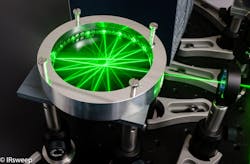 The IRcell, a monolithic circular multipass gas cell intended for optical trace-gas sensing, achieves compactness and small gas volume by folding the sensing laser beam into a star pattern (in this case, a 17-point star) within the cell. The optical path length can be changed by changing the incoming beam's angle (for example, creating a shorter path length by producing a seven-point star). The IRcell, a monolithic circular multipass gas cell intended for optical trace-gas sensing, achieves compactness and small gas volume by folding the sensing laser beam into a star pattern (in this case, a 17-point star) within the cell. The optical path length can be changed by changing the incoming beam's angle (for example, creating a shorter path length by producing a seven-point star).