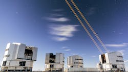 FIGURE 2. ESO's Very Large Telescope is shown with its four Unit Telescopes. In this long-exposure photograph, the four guide star lasers can be seen emerging from Unit Telescope 4 (UT4). FIGURE 2. ESO's Very Large Telescope is shown with its four Unit Telescopes. In this long-exposure photograph, the four guide star lasers can be seen emerging from Unit Telescope 4 (UT4).