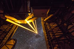 FIGURE 3. UT4 of ESO&apos;s Very Large Telescope is shown pointing to the Southern Cross constellation. The fifth beam comes from the PARLA laser, a technology demonstrator commissioned in 2013.