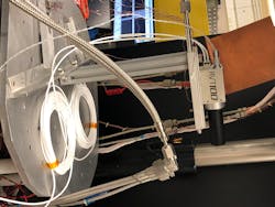 FIGURE 3. The RVT100 camera being installed in a vacuum chamber for low-temperature testing at NASA Goddard Space Flight Center. FIGURE 3. The RVT100 camera being installed in a vacuum chamber for low-temperature testing at NASA Goddard Space Flight Center.