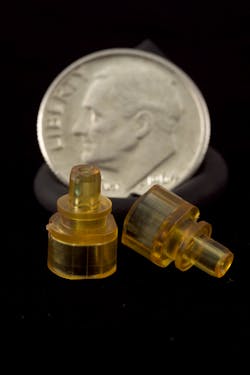 FIGURE 1. Small NIR plastic optics of PEI may be manufactured using the HRDT process. FIGURE 1. Small NIR plastic optics of PEI may be manufactured using the HRDT process.