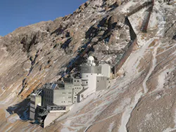 A high-power DIAL system is sited at the Environmental Research Station Schneefernerhaus on Germany’s Zugspitze, above most of the atmosphere’s lower-level moisture. Backscattered light from the DIAL collected by a Newtonian telescope (in the laboratory below the white domes) provides information on the vertical water-vapor distribution in the free troposphere.