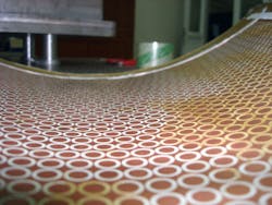 FIGURE 3. Large-scale textures on freeform surfaces can be fabricated using the PPGS method. FIGURE 3. Large-scale textures on freeform surfaces can be fabricated using the PPGS method.