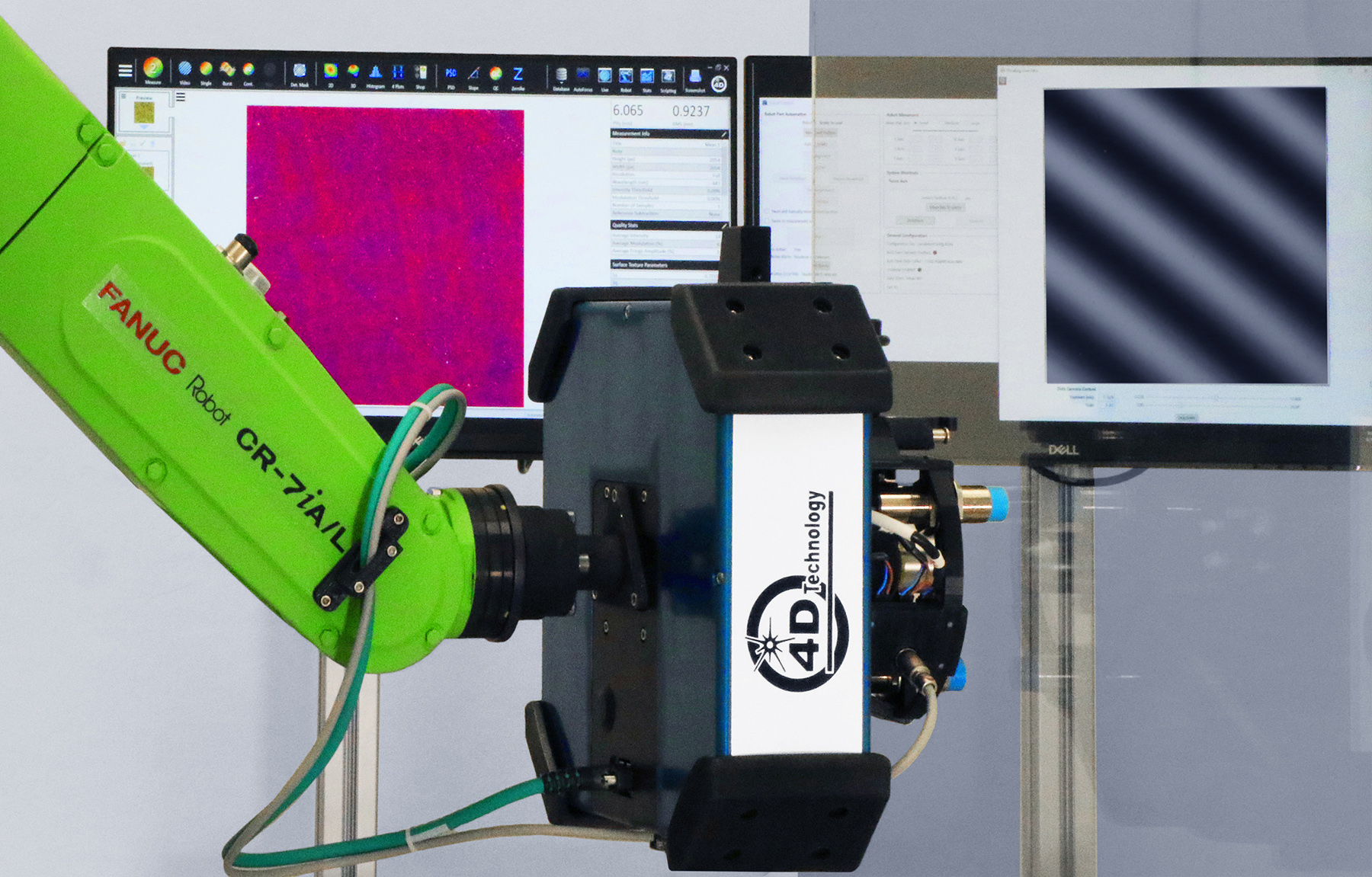 FIGURE 1. An optical profiler mounted on a robot provides roughness metrology for large or highly curved optics.