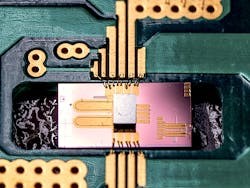 A silicon-photonic optical modulator also contains an electronic CMOS driver; the device operates at rates up to 100 Gbit/s.