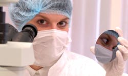 FIGURE 1. Developing diagnostics from surface-enhanced resonance Raman scattering (SERRS) requires several precise processes, including creating the proper substrate, such as the shiny silicon wafer shown here. FIGURE 1. Developing diagnostics from surface-enhanced resonance Raman scattering (SERRS) requires several precise processes, including creating the proper substrate, such as the shiny silicon wafer shown here.