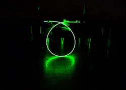This mid-IR fiber laser owes its ability to produce 25X the power of standard lasers to a novel setup. The result is greater sensitivity, and thus an ability to analyze breath among other gases.