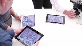 FIGURE 1. DMshare, which &apos;has revolutionized how things go in my classroom,&apos; according to Maria Moreno of Yale, distributes microscope images to iPads.