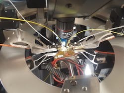 FIGURE 2. Silicon photonic components are positioned and probed in real time. FIGURE 2. Silicon photonic components are positioned and probed in real time.