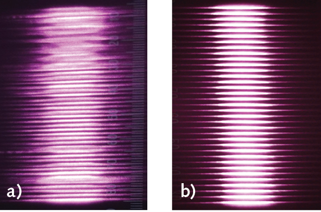 FIGURE 9. Laser images at 30 cm from high-SMILE DMCC vertical stack (a) and low-SMILE DMCC vertical stack (b) collimated by FAC lenses.