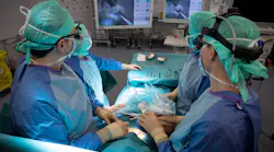 FIGURE 1. Fluorescence-guided surgery promises to reveal specific tissues, here exemplified by the use of the handheld Fluobeam, which integrates 750 nm illumination with an imaging sensor.