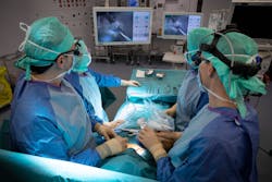 FIGURE 1. Fluorescence-guided surgery promises to reveal specific tissues, here exemplified by the use of the handheld Fluobeam, which integrates 750 nm illumination with an imaging sensor. FIGURE 1. Fluorescence-guided surgery promises to reveal specific tissues, here exemplified by the use of the handheld Fluobeam, which integrates 750 nm illumination with an imaging sensor.