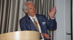 FIGURE 1. Electrical engineering and laser pioneer Gérard Mourou in 2014 at the international symposium From Ultrafast to Extreme Light.