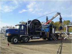 FIGURE 2. For a downhole sensor being deployed in a SAGD well in Canada, the fiber-optic cable is integrated within a larger coiled tube along with other sensors. The entire sensor 'string' is injected into the well using the service rig. FIGURE 2. For a downhole sensor being deployed in a SAGD well in Canada, the fiber-optic cable is integrated within a larger coiled tube along with other sensors. The entire sensor 'string' is injected into the well using the service rig.