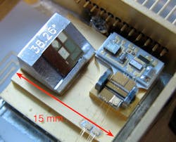 FIGURE 2. A miniature external-cavity quantum-cascade laser (ECqcL) has a tunable microelectromechanical systems (MEMS)-based grating. The entire laser fits inside a 2 cc volume. FIGURE 2. A miniature external-cavity quantum-cascade laser (ECqcL) has a tunable microelectromechanical systems (MEMS)-based grating. The entire laser fits inside a 2 cc volume.