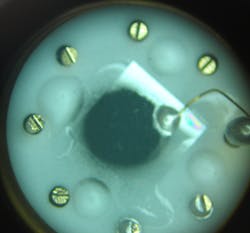 FIGURE 3. The multiwall carbon nanotube (CNT) absorbing coating is visible on a thin-film pyroelectric terahertz detector. FIGURE 3. The multiwall carbon nanotube (CNT) absorbing coating is visible on a thin-film pyroelectric terahertz detector.