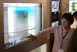 FIGURE 4. A transparent &ldquo;window display&rdquo; uses standard TFT LCD materials but can also display small digital messages or images.