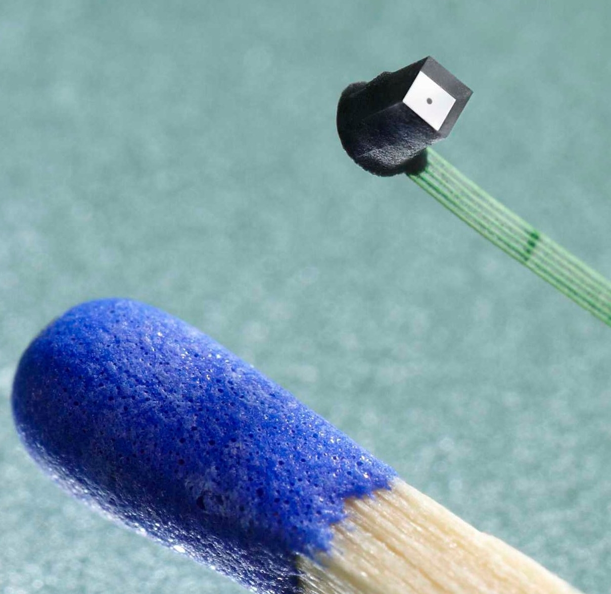Through-silicon-via (TSV) technology enables low-cost CMOS cameras smaller than a match head.
