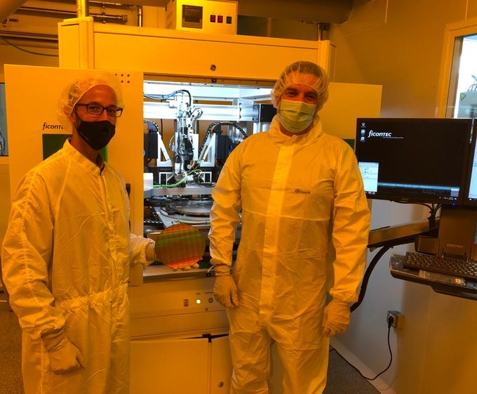 VLC Photonics&rsquo; CTO David Domenech and ficonTEC Production Engineer Tim Kluge after installation of the new WLT system.
