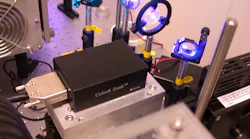FIGURE 1. The 355-nm Cobolt Zouk laser in a total internal reflection fluorescence (TIRF) microscopy setup. Zouk is a single-mode DPSS laser offering 10 mW CW in a 5 × 2.8 × 1.8-in. hermetically sealed package, with very low-intensity noise, and in a high-quality TEM00-mode and low-divergent beam.