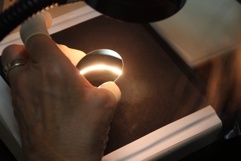 FIGURE 4. Inspection of high-LIDT optics during process development and, later, in volume production is an integral part of the complete optics fabrication process.