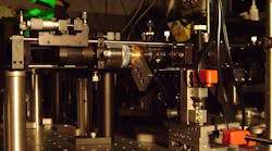 A microscope apparatus is being used at NIST to understand differences between near-resonance and far-from-resonance trapping and tweezing of particles. The study could improve the prospects for near-resonant trapping at lower power levels, to limit damage to biological specimens.