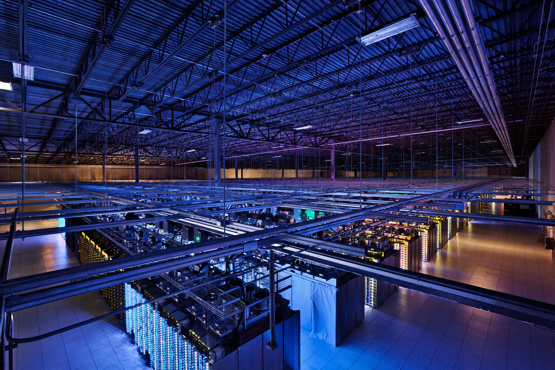 FRONTIS. An increasing amount of computing and data storage is migrating to a planetary cloud of warehouse-scale datacenters like this one.