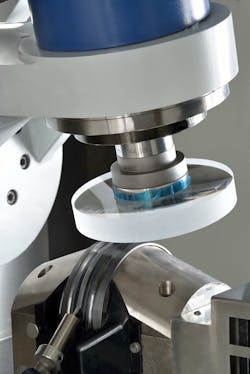 Using MRF, a 200 mm collimator lens being polished corrects for surface figure at QED Optics. Using MRF, a 200 mm collimator lens being polished corrects for surface figure at QED Optics.