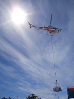 A femtosecond laser (Coherent Chameleon Ultra II) is carried by helicopter on its way to an Antarctic lab, where it became part of a modelocked cavity-enhanced absorption spectroscopy (ML-CEAS) setup used to measure trace molecules in the atmosphere. A femtosecond laser (Coherent Chameleon Ultra II) is carried by helicopter on its way to an Antarctic lab, where it became part of a modelocked cavity-enhanced absorption spectroscopy (ML-CEAS) setup used to measure trace molecules in the atmosphere.