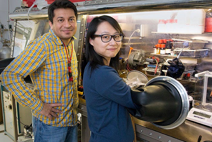 Scientists Aditya Mohite, left, and Wanyi Nie are perfecting a crystal production technique to improve perovskite crystal production for solar cells at Los Alamos National Laboratory.