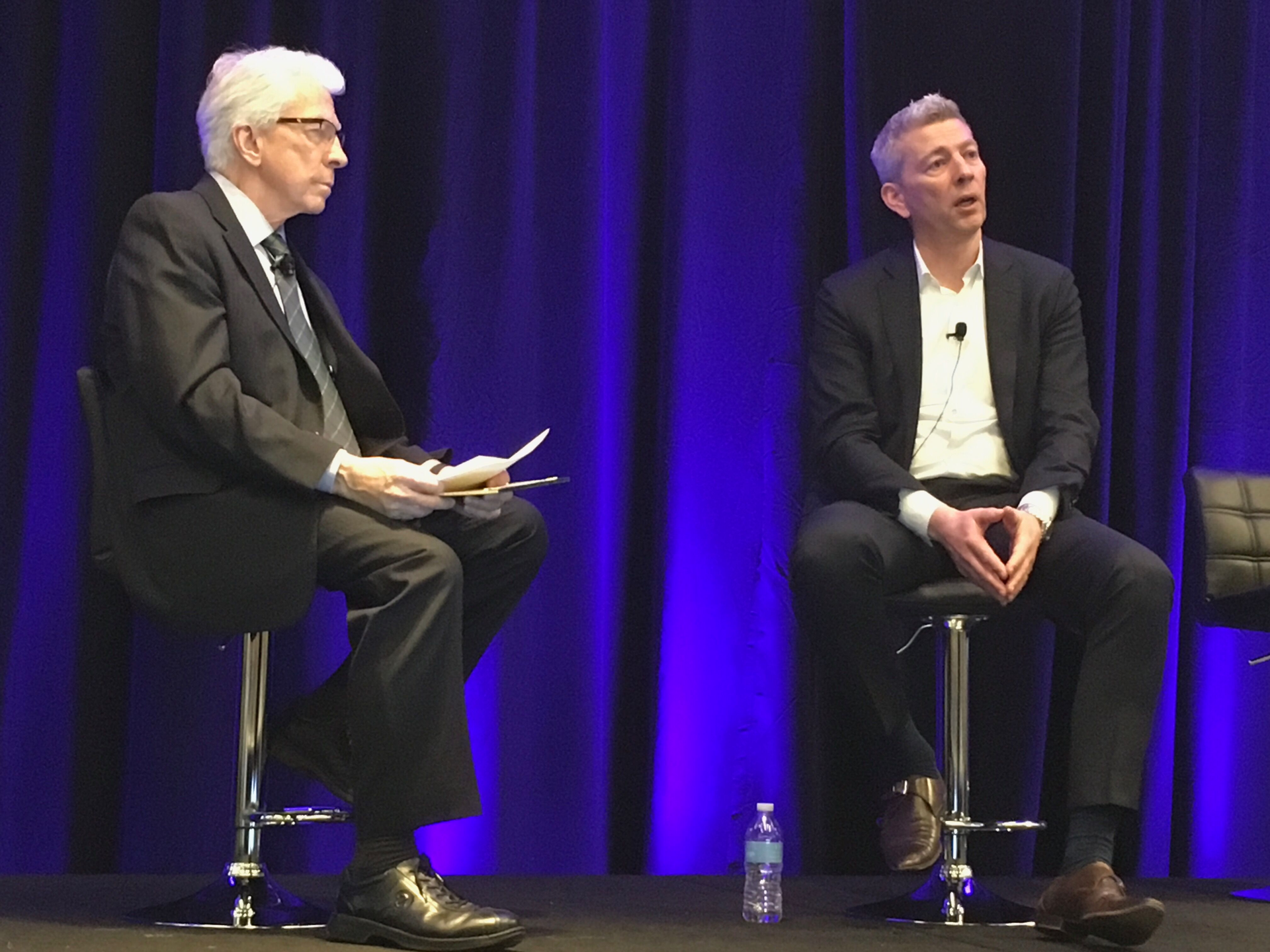 Seminar Chair Conard Holton (left) and Novanta CEO Matthijs Glastra (right) discussed sustainable growth and finding new markets during a discussion after lunch.