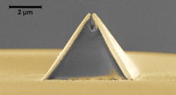 A new process called fiber nanoimprinting speeds fabrication of nanooptical devices, such as this pyramid-shaped Campanile probe imprinted on an optical fiber (captured in a scanning electron microscope image). The gold layer is added after imprinting and the gap at the top is 70 nm wide. A new process called fiber nanoimprinting speeds fabrication of nanooptical devices, such as this pyramid-shaped Campanile probe imprinted on an optical fiber (captured in a scanning electron microscope image). The gold layer is added after imprinting and the gap at the top is 70 nm wide.