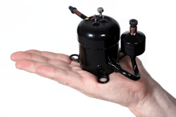 FIGURE 2. A miniature compressor that is at the heart of a direct-refrigerant cooling system—this one was developed by Aspen Systems. FIGURE 2. A miniature compressor that is at the heart of a direct-refrigerant cooling system—this one was developed by Aspen Systems.