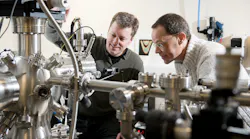 University of Warwick researchers Gavin Bell and Yorck Ramachers oversee some lab hardware.