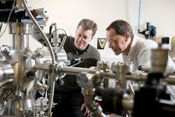 University of Warwick researchers Gavin Bell and Yorck Ramachers oversee some lab hardware.