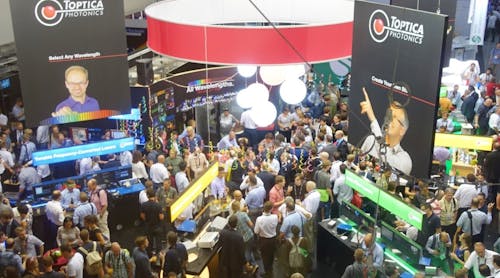 FIGURE 1. Not an insider tip anymore&mdash;the Toptica booth party is traditionally the best at the LASER fair.
