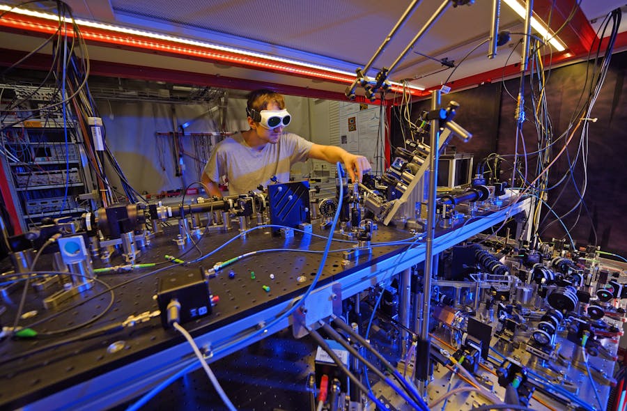 FIGURE 2. Tobias Frank, a Ph.D. candidate in Professor Gerhard Rempe&rsquo;s Quantum Dynamics group at MPQ, prepares a single ultracold atom to be placed inside the crossed resonator setup.
