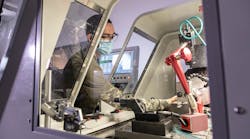 A student in the Optical Systems Technology program at Monroe Community College learns to operate the Moore Nanotechnology Systems 250 UPL diamond-turning machine. A student in the Optical Systems Technology program at Monroe Community College learns to operate the Moore Nanotechnology Systems 250 UPL diamond-turning machine.