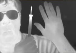 FIGURE 2. A scene captured with an LWIR strained layer superlattice (SLS) broadband FPA with 640 × 512 format and using an LWIR optic shows one of the authors, Arn Adams, holding a hot soldering iron. FIGURE 2. A scene captured with an LWIR strained layer superlattice (SLS) broadband FPA with 640 × 512 format and using an LWIR optic shows one of the authors, Arn Adams, holding a hot soldering iron.