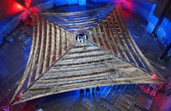 FIGURE 1. A NASA prototype solar sail was fabricated with a conventional metallic reflective surface; however, a diffractive solar-sail concept developed at the Rochester Institute of Technology has potential advantages that include higher efficiency and less absorption. FIGURE 1. A NASA prototype solar sail was fabricated with a conventional metallic reflective surface; however, a diffractive solar-sail concept developed at the Rochester Institute of Technology has potential advantages that include higher efficiency and less absorption.