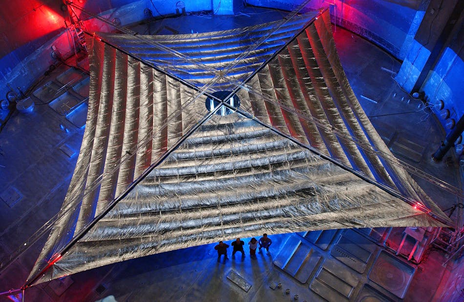 FIGURE 1. A NASA prototype solar sail was fabricated with a conventional metallic reflective surface; however, a diffractive solar-sail concept developed at the Rochester Institute of Technology has potential advantages that include higher efficiency and less absorption.